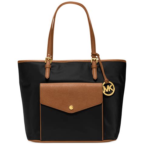 michael kors jet set large pocket multifunction tote black|michael kors large luggage sets.